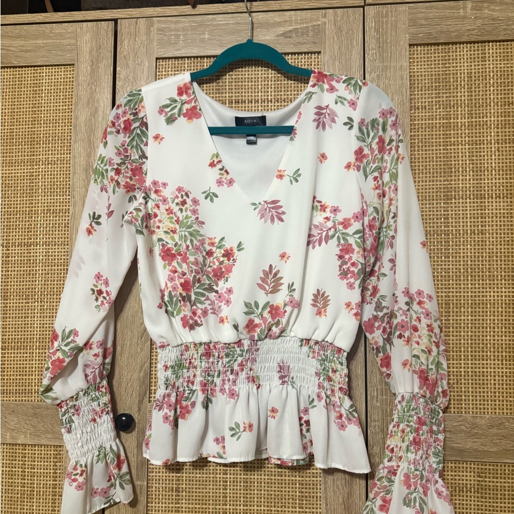 Aqua Floral V-Neck Smocked Peplum Blouse in White and Pink